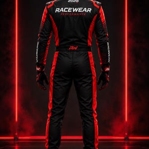May include: A black and red racing suit featuring the text RACEWEAR PERFORMANCE and 2026 on the back. The suit includes matching black and red gloves and racing boots, all marked with the RN logo, designed for high-performance automotive activities.
