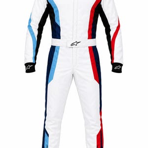 May include: A white racing suit featuring a black collar, cuffs, and side panels. The suit includes light blue and red vertical stripes, a BMW M logo on the chest, and Alpinestars branding on the shoulders, waist belt, and lower legs.