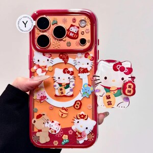 Lucky Maneki Neko Hello Kitty Phone Case with 3D Shaker Grip & Red Bead Charm, Lunar New Year Gift for iPhone 17 16 15 14 13 Pro Max Cover image 3
