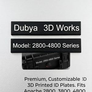 May include: Black 3D printed ID plates with white text. The top plate reads "Dubya 3D Works," and the bottom plate says "Model: 2800-4800 Series." The plates are shown with a black case. The image also includes the text "Premium, Customizable 3D 3D Printed ID Plates. Fits Apache 2800, 3800, 4800 Cases."