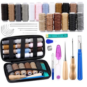 May include: A sewing kit with various spools of thread in multiple colors, needles, and other tools. The kit includes a black zippered case, a measuring tape, a thimble, and several tools with wooden and plastic handles.