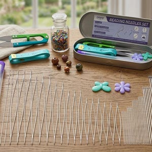 May include: A beading needles set with various tools. The set includes a metal case, scissors, a measuring tape, a glass jar filled with beads, and several needles. The case reads "Beading Needles Set". There are also decorative flower and butterfly shaped pins.