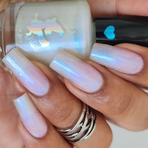 Pearl semi-sheer opalite shimmer glow in the dark indie nail polish - Spellbound Nails Ghostly Guardian