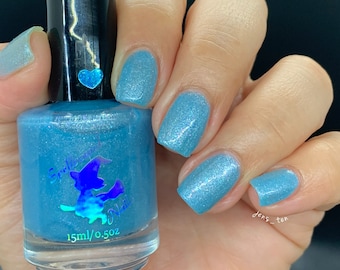 Baby blue shimmer glow in the dark indie nail polish - Spellbound Nails Little Wraith