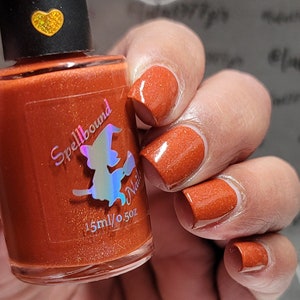 Rust red orange holographic indie nail polish - Spellbound Nails Messenger of the Gods