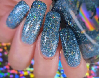 Baby blue and silver holographic glitter topper indie nail polish - Spellbound Nails Crybaby