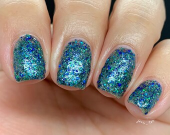 Stardust - custom handcrafted blue glitter topper nail polish