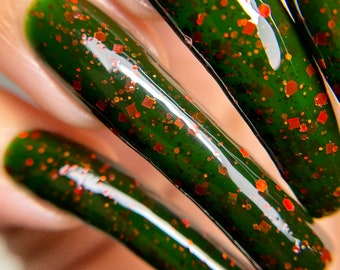 Green jelly indie nail polish with red holographic glitter - Spellbound Nails Persephone