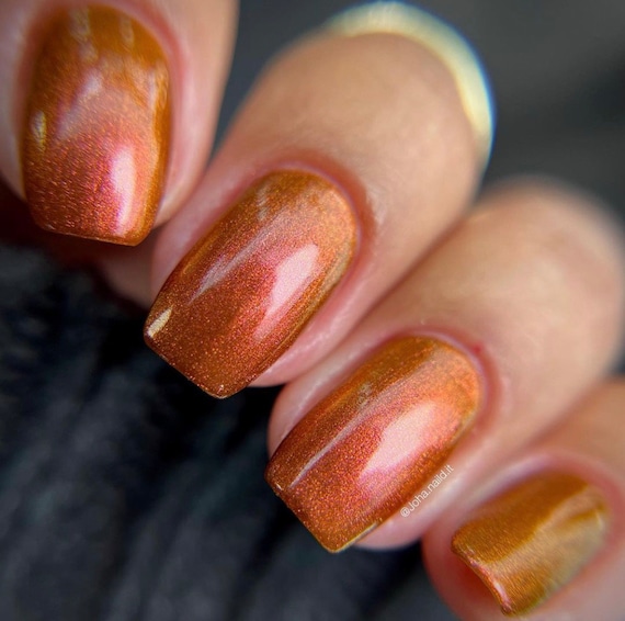 orange chrome nails