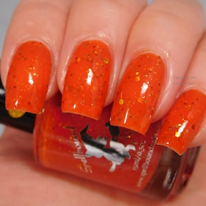 Orange jelly with holographic gold and copper glitter indie nail polish - Spellbound Nails Pumpkin Spice Latte