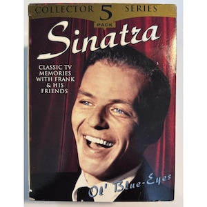 May include: A red, white, and gold box with the text "Collector 5 Series" and "Sinatra" on the front. The box features a photo of Frank Sinatra smiling with the text "Classic TV Memories with Frank & His Friends" and "Ol' Blue-Eyes" on the bottom.