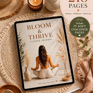 May include: A digital fitness journal titled Bloom & Thrive Fitness Journal with 218 pages for fitness, wellness, and self-care. The cover features a person sitting in a meditative pose, surrounded by pampas grass and vases. It includes 75 soft challenge pages.