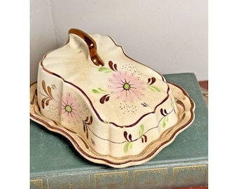 Mantequera antigua de Old Castle, Staffordshire, Inglaterra, con borde dorado y cerámica craquelada.