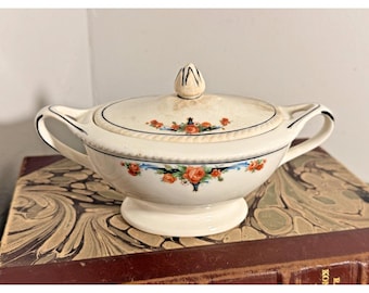 Plato con tapa de cerámica Crown Pottery vintage con decoración floral craquelada.