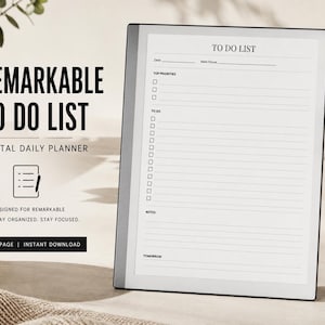 May include: A digital tablet displaying a to-do list template with sections for top priorities, daily tasks, notes, and tomorrow. The screen shows the text TO DO LIST, TOP PRIORITIES, TO DO, NOTES, and TOMORROW. A black stylus rests beside the tablet.