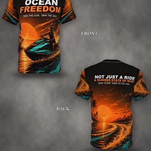May include: A short-sleeved t-shirt featuring a sunset jet ski graphic. The front displays the text OCEAN FREEDOM RIDE THE SUN. OWN THE SEA. The back features the text NOT JUST A RIDE A SUMMER STATE OF MIND BORN TO RIDE. MADE TO LIVE FREE.