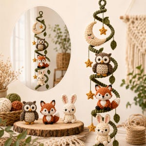 May include: A vertical crochet mobile featuring a spiral green vine adorned with small green leaves and yellow stars. Suspended from the vine are a cream-colored crescent moon with a face, a brown owl, an orange fox, and a cream-colored rabbit.