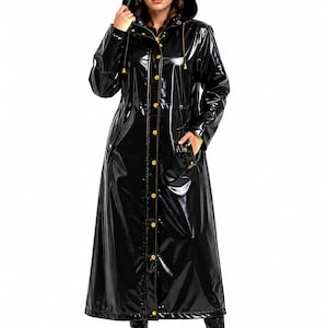 May include: A long, black, glossy, patent-finish raincoat featuring a hood, long sleeves, and a front placket with gold-toned snap buttons. The coat includes two side pockets with snap closures and a drawstring cord at the hood neckline.