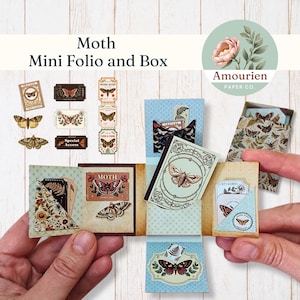 May include: A miniature moth-themed folio and box set. The set includes a small box and a multi-panel folio with moth illustrations and decorative elements. The color palette includes brown, beige, and blue tones. The text "Moth Mini Folio and Box" is visible.