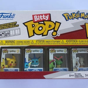 May include: A Funko Bitty Pop! Pokémon 4-pack box containing four miniature vinyl figures of Pikachu, Vaporeon, Caterpie, and Cubone. The white and red packaging features the Bitty Pop! logo, the Pokémon brand name, and a clear window display.