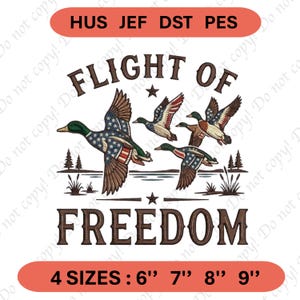 May include: An embroidery design featuring three ducks in flight with American flag patterns on their wings. The text reads FLIGHT OF FREEDOM, HUS JEF DST PES, and 4 SIZES : 6" 7" 8" 9". The scene includes silhouettes of pine trees and reeds.