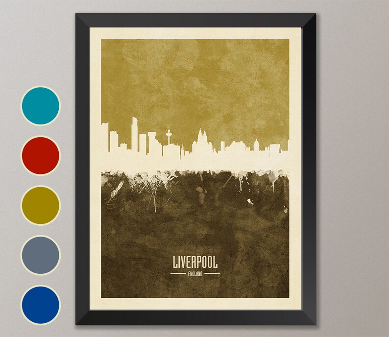 May include: A framed print of the Liverpool skyline in white against a brown and gold background. The text "LIVERPOOL" and "ENGLAND" is at the bottom of the print.
