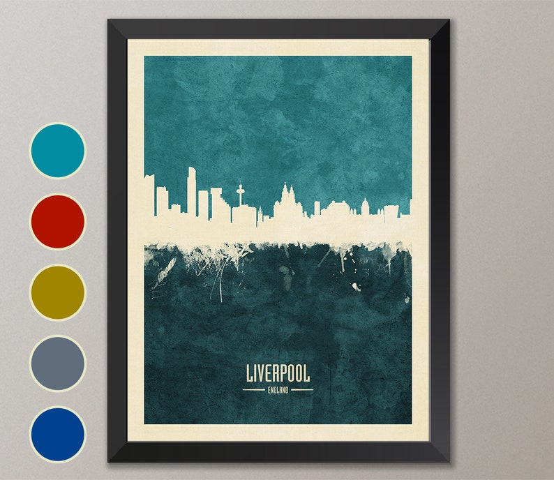 May include: A teal blue and white cityscape print of Liverpool, England. The skyline is white against a teal blue background with a grunge texture. The city name and location are printed in white at the bottom of the print.