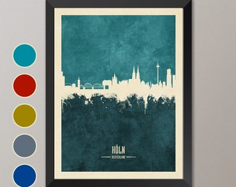 May include: A teal blue watercolor cityscape of Cologne, Germany. The skyline is white and includes the Cologne Cathedral. The text "KÖLN - DEUTSCHLAND" is at the bottom of the image.