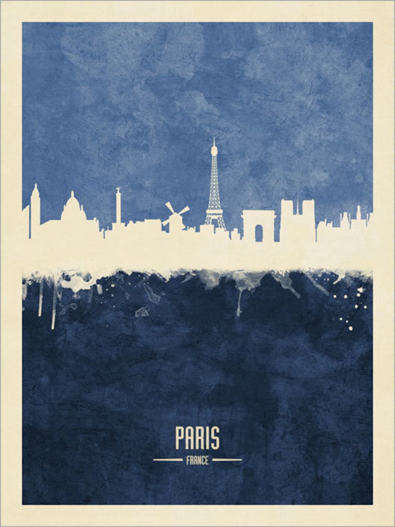 May include: A watercolor-style illustration of the Paris skyline, featuring the Eiffel Tower, the Arc de Triomphe, and other iconic landmarks. The background is a deep blue color with white splatters of paint. The text "PARIS - FRANCE" is printed below the skyline.