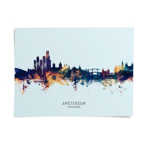 The image is a watercolor painting of the skyline of Amsterdam, Netherlands, featuring the city's iconic landmarks and architecture in a colorful, abstract style.