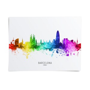 The image is a colorful watercolor illustration of the Barcelona skyline, featuring the city's iconic landmarks and architecture in a vibrant rainbow-like palette.