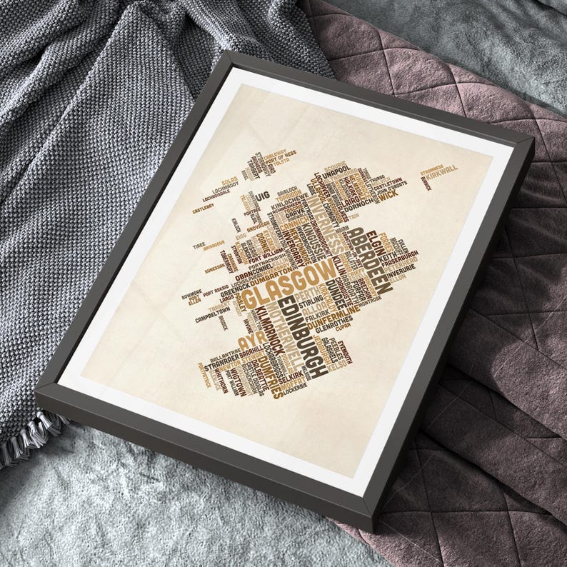 The image is a framed poster or artwork depicting a map of Glasgow, Scotland, with various city names and locations represented in a stylized manner.