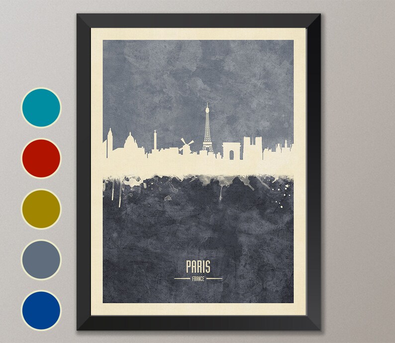 May include: A watercolor-style illustration of the Paris skyline in white against a blue background. The Eiffel Tower is the most prominent feature, with other landmarks like the Arc de Triomphe and Sacr&eacute;-C&oelig;ur Basilica visible. The text "PARIS - FRANCE" is printed below the skyline.