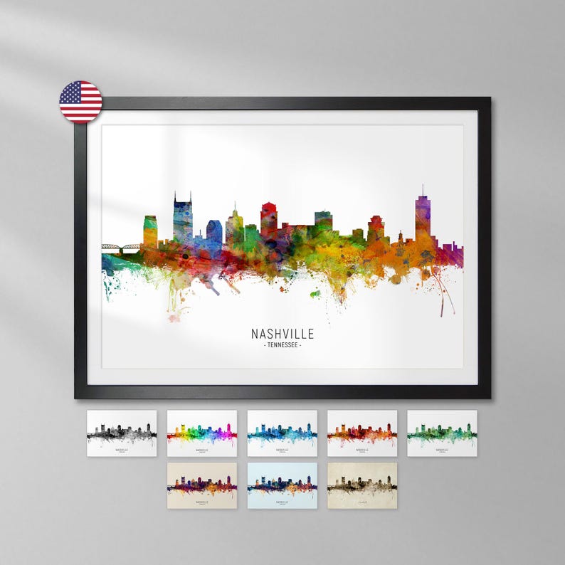 a framed watercolor painting of the Nashville skyline, with a small American flag on top of the frame.
