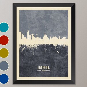 May include: A blue and white cityscape silhouette of Liverpool, England. The skyline is set against a textured blue background with white paint splatters.