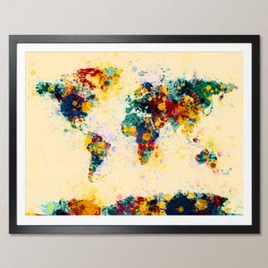May include: A world map illustration with a watercolor paint splatter effect in shades of blue, green, red, yellow, and orange on a cream background.