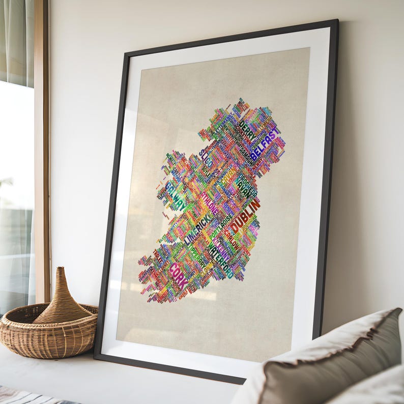 a large framed collage of colorful words that spell out the word "DUBLIN", creating a visually striking and creative representation of the city.
