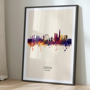 a framed picture of a city skyline
