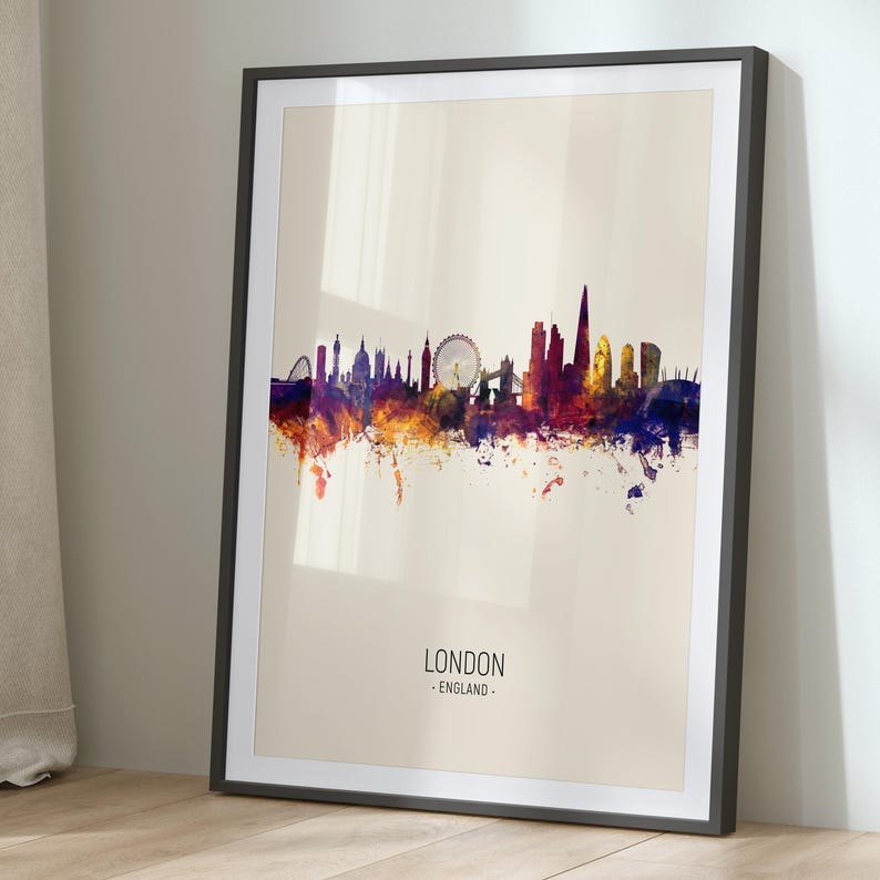 a framed picture of a city skyline
