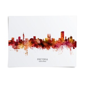 The image is a watercolor painting of the Pretoria skyline, depicting the city's iconic buildings and landmarks in a vibrant, colorful style.