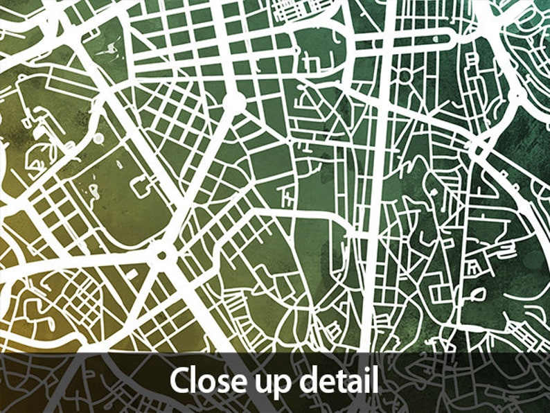May include: A detailed map of a city with white lines on a green and yellow watercolor background. The map shows streets, roads, and waterways.