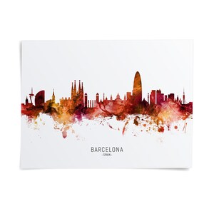 The image is a watercolor painting of the Barcelona skyline, featuring the city's iconic landmarks and architecture in a vibrant, colorful style.