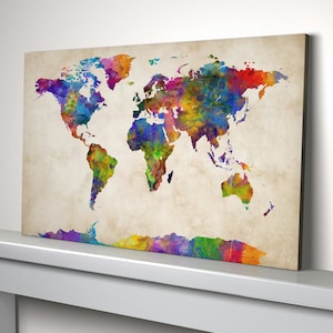 May include: A watercolour world map with a vintage background. The map is painted in shades of blue, green, yellow, orange, red, and purple.