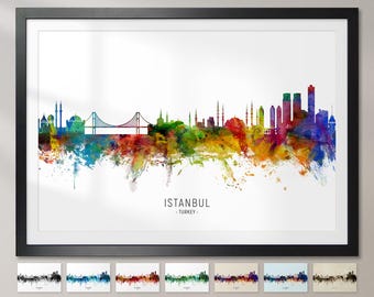 May include: A watercolor painting of the Istanbul skyline, featuring the iconic Bosphorus Bridge and minarets. The city is depicted in a vibrant palette of colors, with splashes of blue, green, yellow, orange, and red. The text "ISTANBUL - TURKEY -" is printed below the skyline.