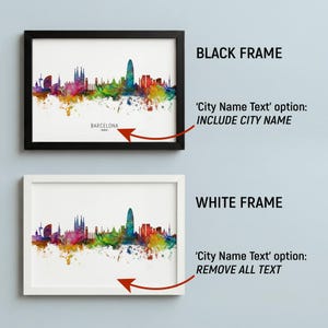 two framed cityscape artworks, one in a black frame and the other in a white frame. The black frame has a city skyline with a watercolor-like effect, while the white frame has a more traditional cityscape. The black frame has a "City Name Text" option, and the white frame has a "City Name Text" option, with the latter option being removed.