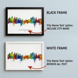 two framed cityscape artworks, one in a black frame and the other in a white frame. The black frame has a city name text option, while the white frame does not.