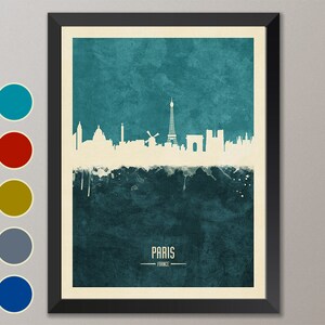 May include: A teal watercolor cityscape of Paris, France. The Eiffel Tower is the tallest building in the skyline. The city name is written in white at the bottom of the image.