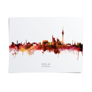 The image is a watercolor painting of the Berlin skyline, featuring the city's iconic landmarks and architecture in a vibrant, colorful style.