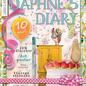 May include: The cover of "Daphne's Diary" magazine has a celebratory theme. A large cake with pink frosting and red roses is in the foreground. A yellow cabinet and a rooster are also visible. Text includes "10 years", "Art poster", and "Cake box".