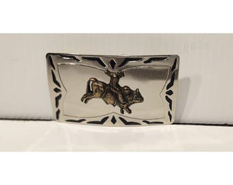 Hebilla de cinturón de estilo western con motivo de rodeo de toros, de la marca Vintage Rockmount Ranch Wear.